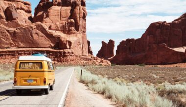 yellow Volkswagen van on road
