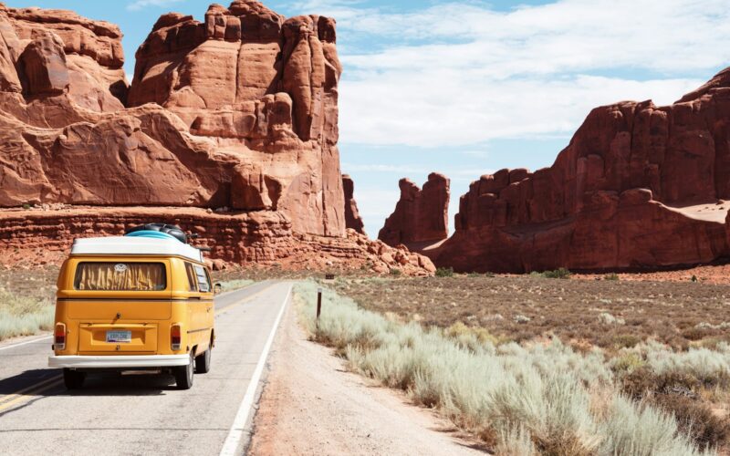yellow Volkswagen van on road
