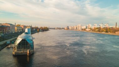 a large body of water next to a city