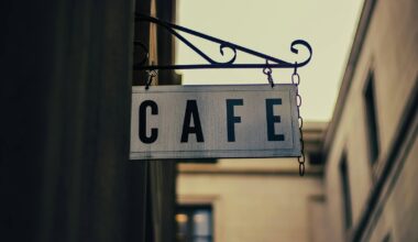 a close up of a street sign hanging from a pole