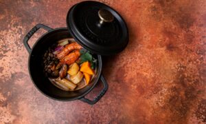 black cooking pan with food