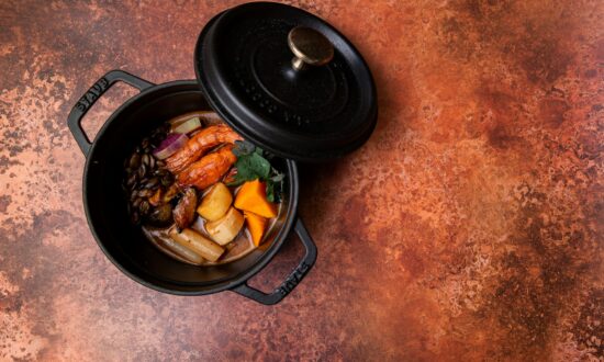 black cooking pan with food