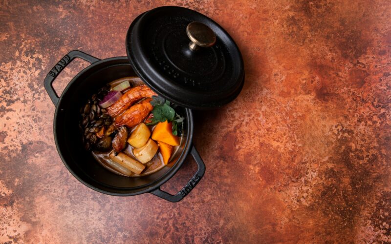 black cooking pan with food