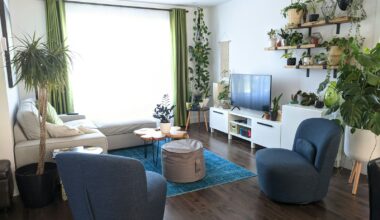 gray sofa chair near green potted plant